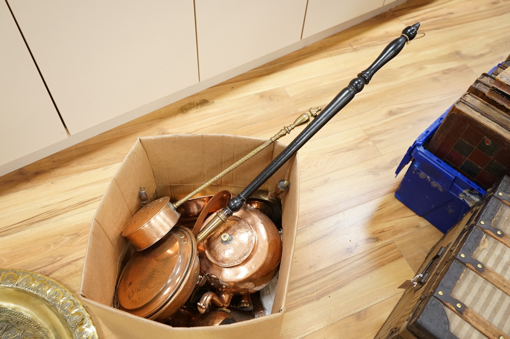 A group of metalware to include brass trays and copper warming pans